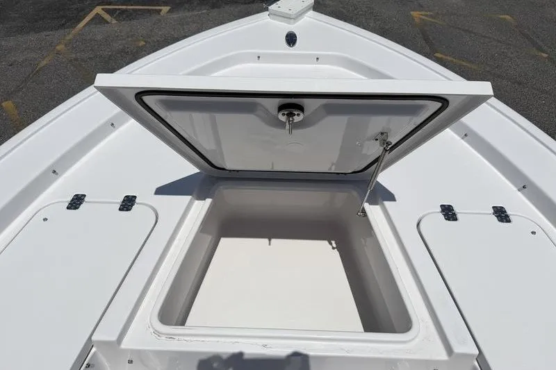 Slide: The Image of Open storage compartment on 2027 Sportsman Masters 247 Bay Boat deck. - 26