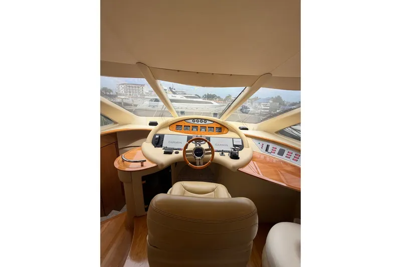 Slide: The Image of Interior view of 2006 Azimut 55E yacht cockpit with Garmin navigation system. - 22