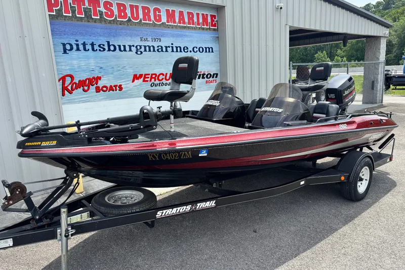 Slide: The Image of 1997 Stratos 282 DC boat on trailer at Pittsburg Marine dealership. - 1