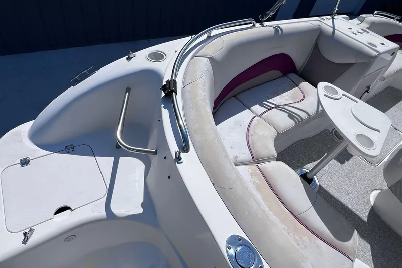 Slide: The Image of 2005 Hurricane FunDeck GS 202 OB boat interior with seating and table. - 24