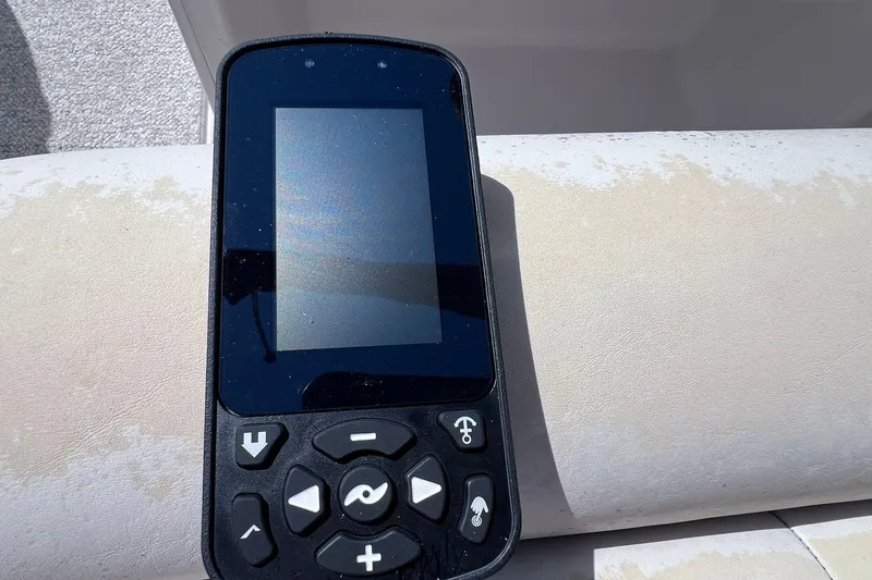 Slide: The Image of Handheld GPS device on a 2005 Hurricane FunDeck GS 202 OB boat seat. - 19