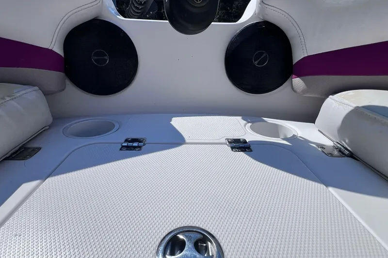 Slide: The Image of Interior of a 2005 Hurricane FunDeck GS 202 OB boat, featuring speakers and seating. - 17