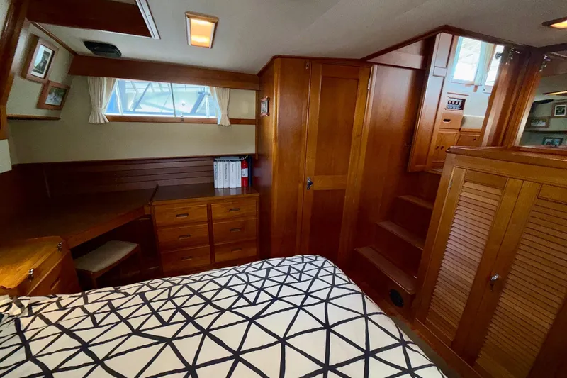 Slide: The Image of Cozy cabin interior of 1988 Grand Banks 42 Classic yacht with wooden furnishings. - 59