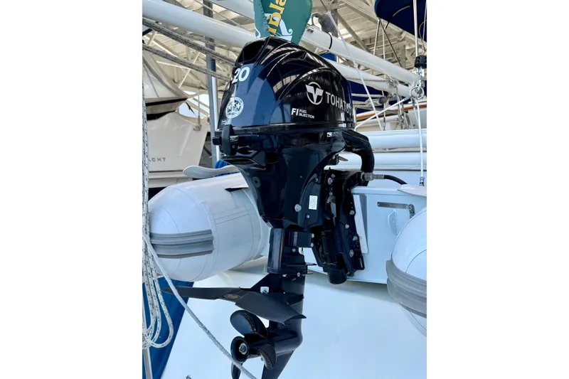 Slide: The Image of Tohatsu 20 HP outboard motor on a 1988 Grand Banks 42 Classic yacht. - 20