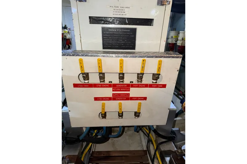 Slide: The Image of Control panel of a 1988 Grand Banks 42 Classic yacht engine room. - 78