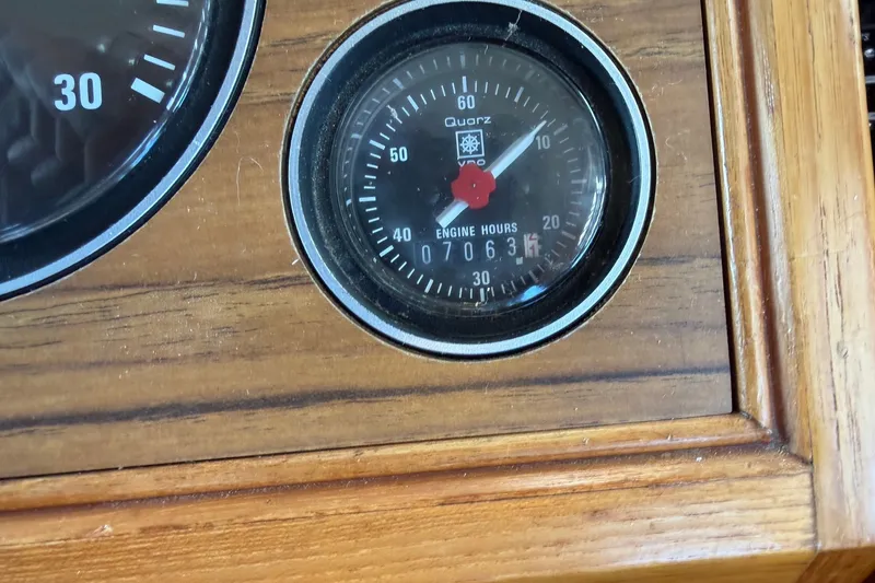 Slide: The Image of Engine hour meter on 1988 Grand Banks 42 Classic, showing 7063 hours. - 36