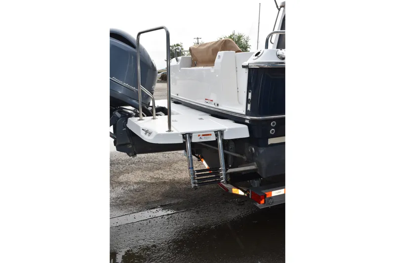 Slide: The Image of 2019 Ranger Tugs R-23 boat stern with swim platform and ladder. - 9