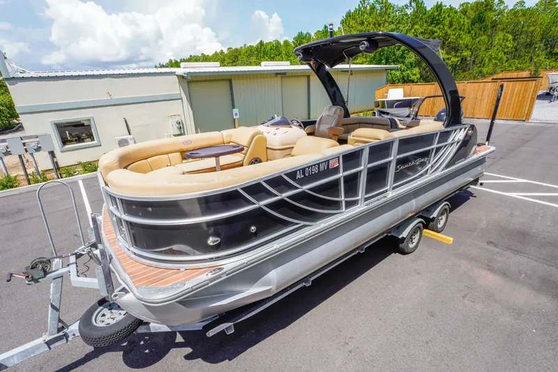Slide: The Image of 2016 South Bay 724 SPORT DLX pontoon boat on trailer, parked outdoors. - 15