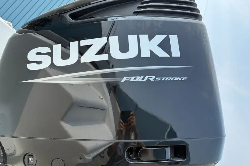 Slide: The Image of Suzuki Four Stroke engine on 2023 Sea Pro 242 Center Console boat. - 5