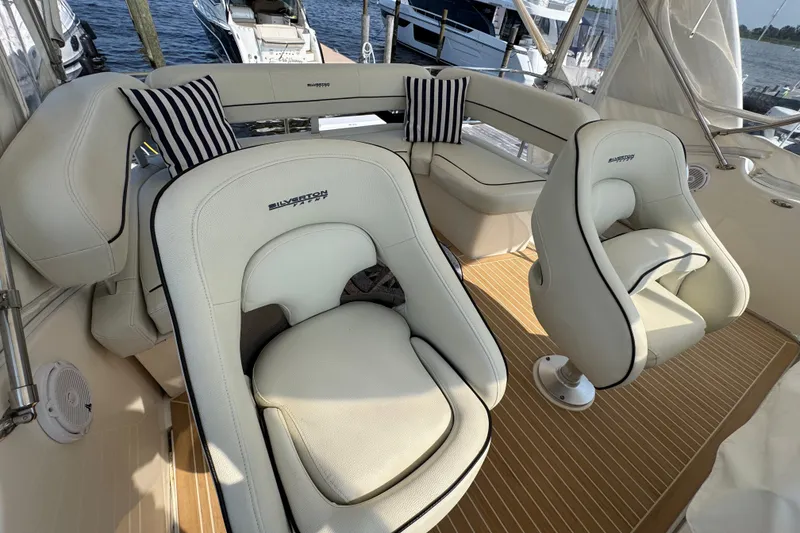 Slide: The Image of Luxurious interior of a 2005 Silverton 34 Convertible yacht with plush seating. - 26