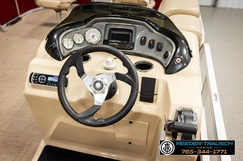 Slide: The Image of Steering console of 2019 SUNTRACKER 20 DLX boat with gauges and controls. - 31