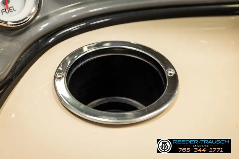 Slide: The Image of Close-up of 2019 SUNTRACKER 20 DLX boat's fuel gauge and cup holder. - 35