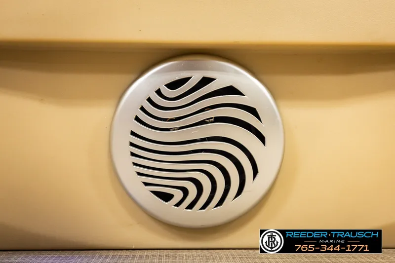 Slide: The Image of Speaker grille on 2019 SUNTRACKER 20 DLX boat, Reeder-Trausch Marine branding visible. - 45