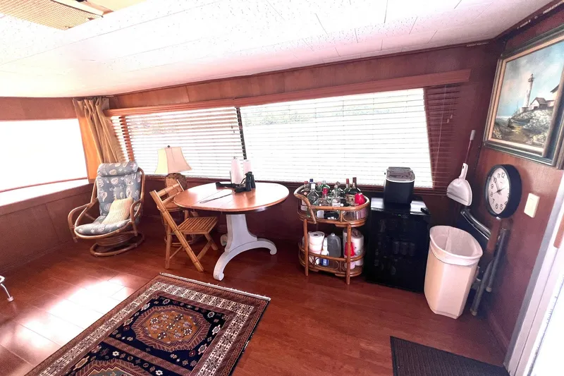 Slide: The Image of Interior of 1982 Pluckebaum Coastal Cruiser with wooden decor and bar setup. - 39