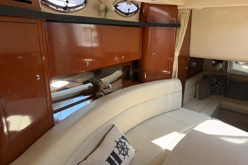 Slide: The Image of Luxurious interior of 2004 Sea Ray 340 Sundancer yacht with elegant wood cabinetry. - 18