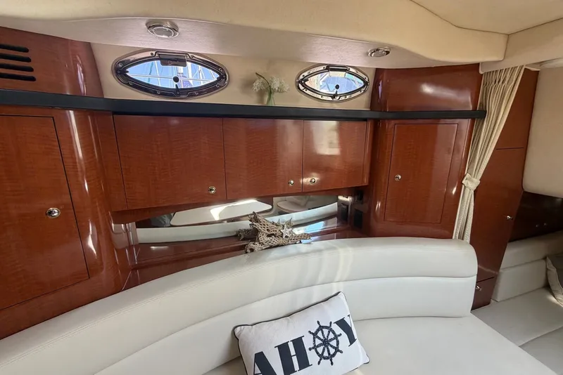Slide: The Image of Luxurious interior of 2004 Sea Ray 340 Sundancer yacht with elegant wood cabinetry. - 19