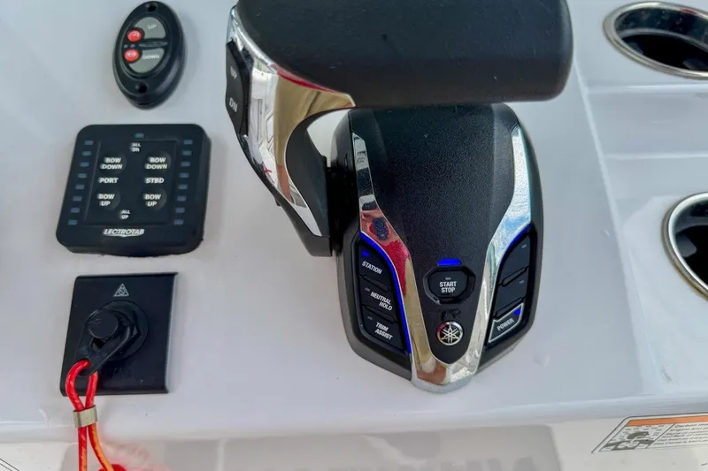 Slide: The Image of Control panel of 2023 Sportsman Heritage 261 Center Console boat. - 25