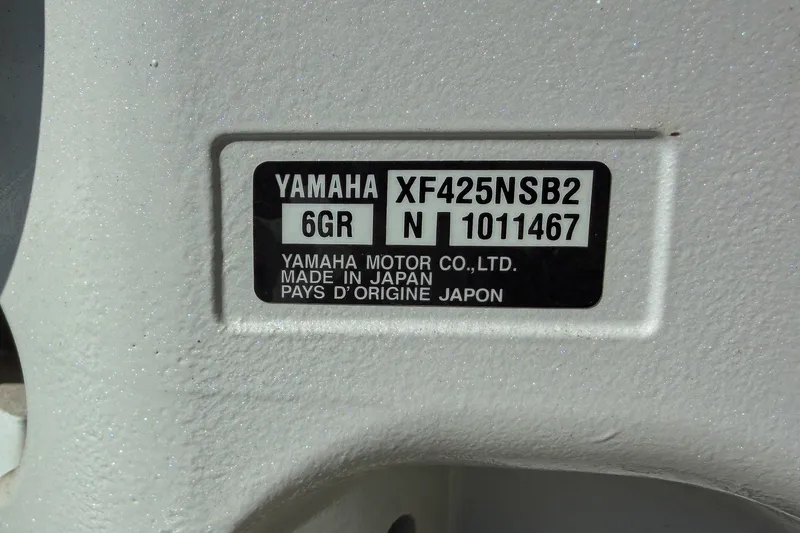Slide: The Image of Label on Yamaha XF425NSB2 engine, Sportsman Heritage 261 Center Console, 2023 model. - 77