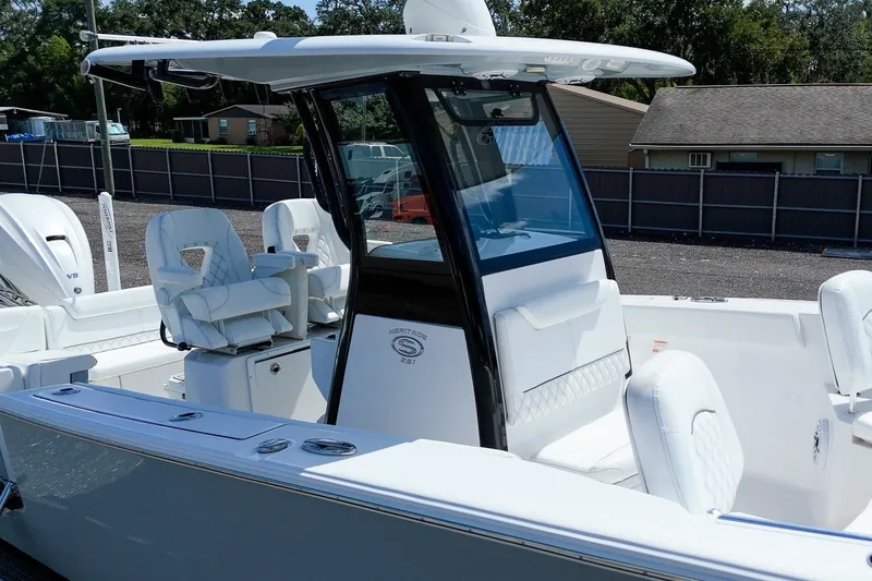 Slide: The Image of 2023 Sportsman Heritage 261 Center Console boat with sleek design and comfortable seating. - 19