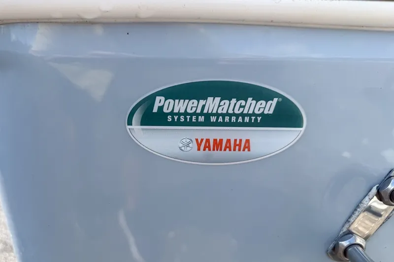 Slide: The Image of 2023 Sportsman Heritage 261 Center Console with Yamaha PowerMatched System Warranty badge. - 76