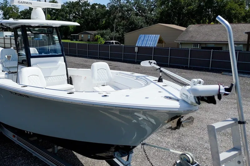 Slide: The Image of 2023 Sportsman Heritage 261 Center Console boat on trailer, featuring Garmin equipment. - 67