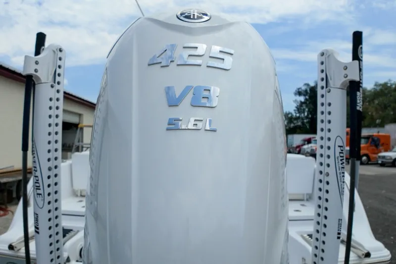 Slide: The Image of 2023 Sportsman Heritage 261 Center Console with 425 V8 5.6L engine, rear view. - 62