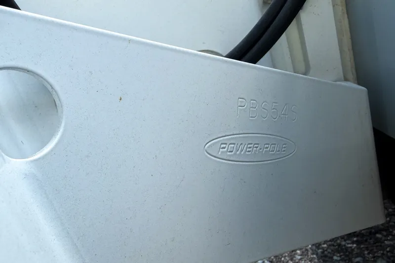 Slide: The Image of Close-up of Power-Pole component on 2023 Sportsman Heritage 261 Center Console boat. - 79