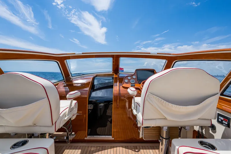 Slide: The Image of Interior view of 2008 Hinckley Talaria 38R Convertible yacht with ocean backdrop. - 10