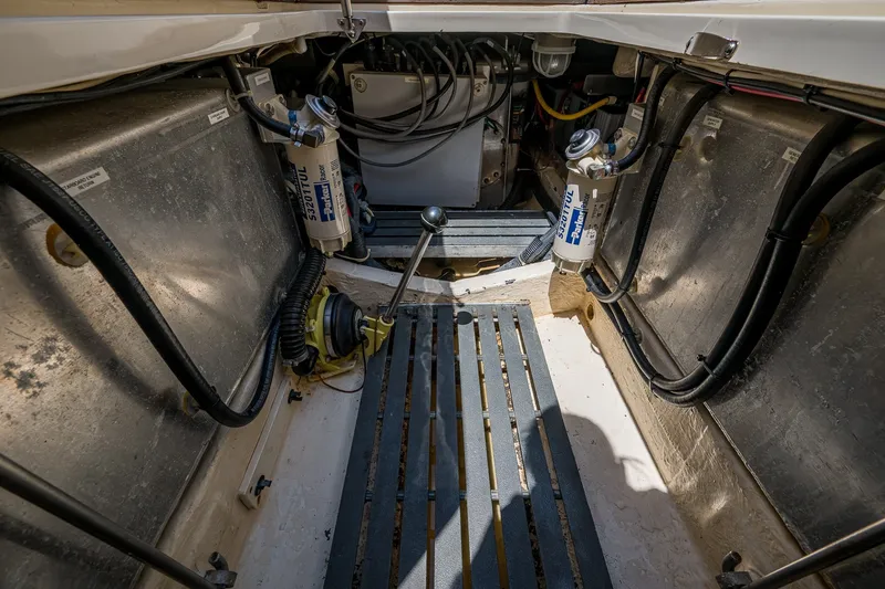 Slide: The Image of Engine compartment of a 2008 Hinckley Talaria 38R Convertible, showcasing mechanical components. - 18