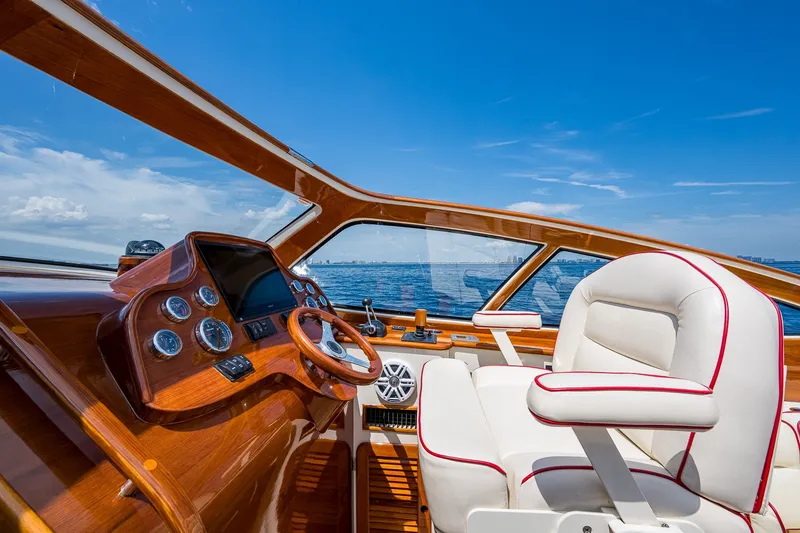 Slide: The Image of Luxurious 2008 Hinckley Talaria 38R Convertible yacht interior with elegant wood and leather design. - 9