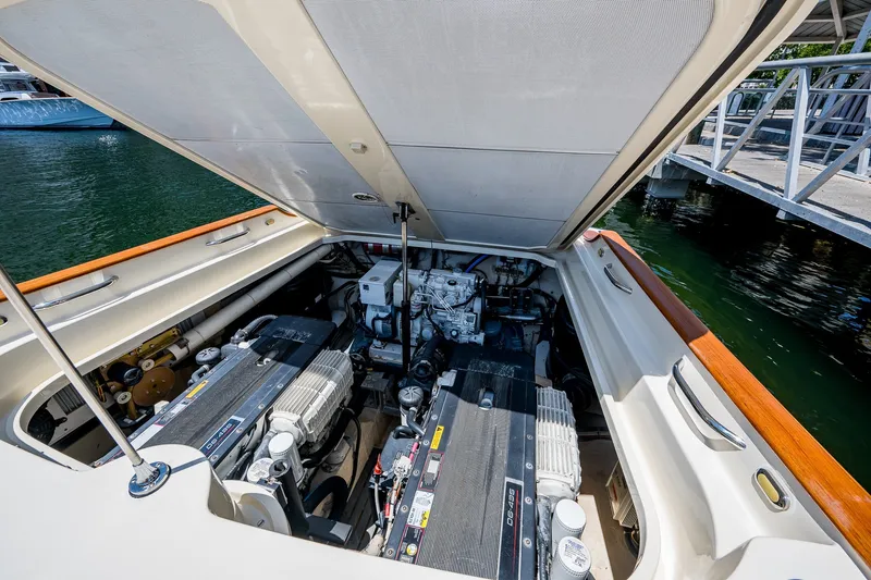Slide: The Image of Engine compartment of 2008 Hinckley Talaria 38R Convertible yacht, dockside view. - 16