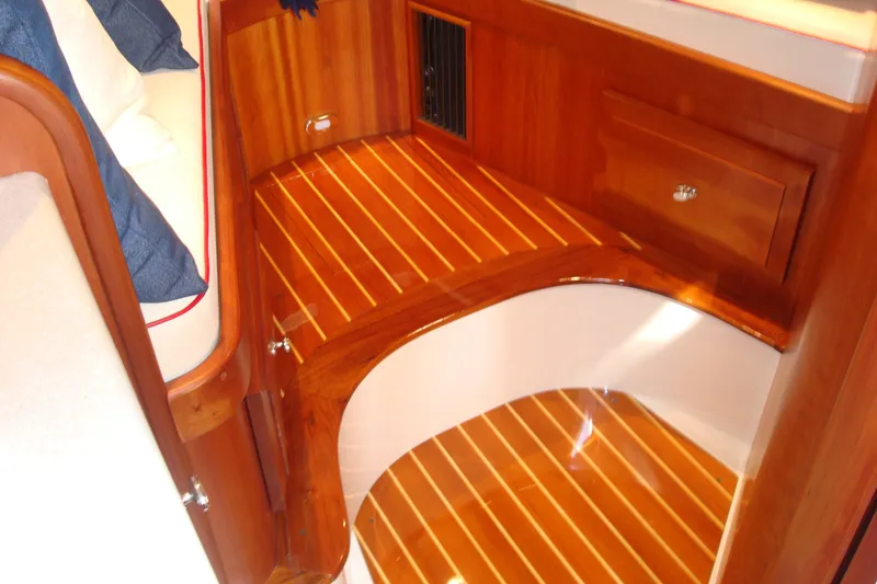 Slide: The Image of Luxurious wooden interior of 2008 Hinckley Talaria 38R Convertible yacht. - 8