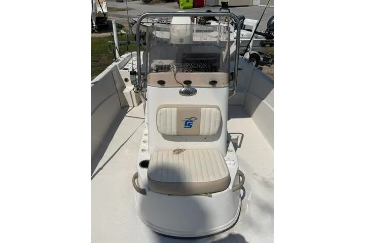 Slide: The Image of 2017 Carolina Skiff 238 DLV boat interior with seating and console. - 13