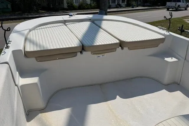 Slide: The Image of 2017 Carolina Skiff 238 DLV boat interior with cushioned seating. - 12