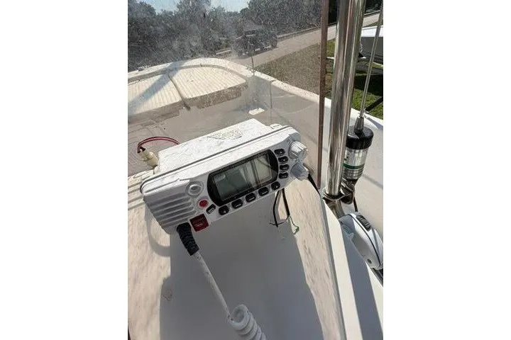Slide: The Image of 2017 Carolina Skiff 238 DLV boat console with radio and controls. - 25
