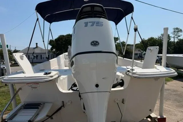 Slide: The Image of 2017 Carolina Skiff 238 DLV boat with 175 HP engine and canopy. - 5
