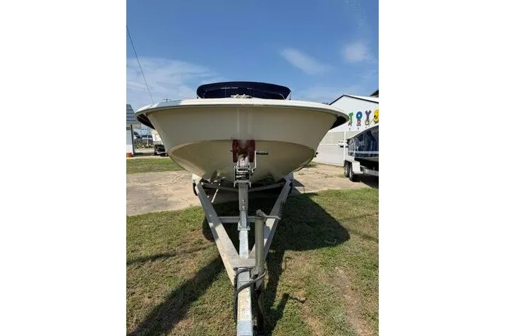 Slide: The Image of 2017 Carolina Skiff 238 DLV boat on trailer, viewed from the front. - 6