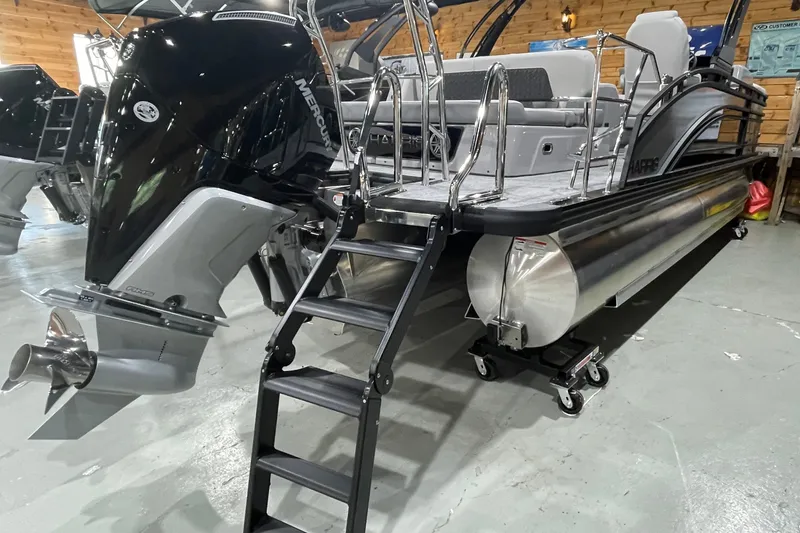 Slide: The Image of 2027 Harris Solstice 230 SL pontoon boat with Mercury outboard engine and boarding ladder. - 15
