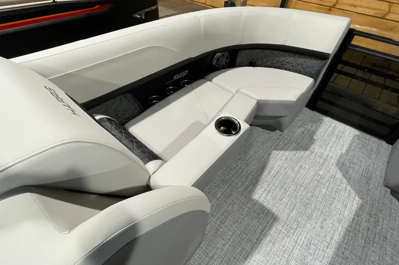 Slide: The Image of Luxurious seating on the 2027 Harris Solstice 230 SL boat, featuring elegant upholstery and cup holders. - 26