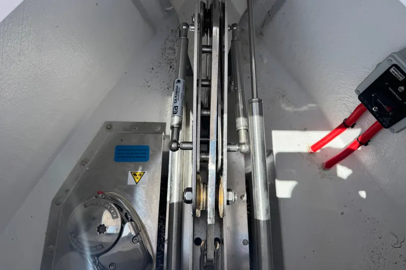 Slide: The Image of Mechanical components inside a 2026 VIRTUE YACHTS V33 Top, featuring hydraulic and electrical systems. - 15