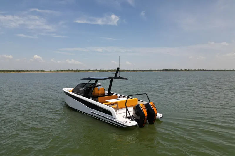 Slide: The Image of Virtue Yachts V33 Top 2026 on calm water under clear sky. - 5