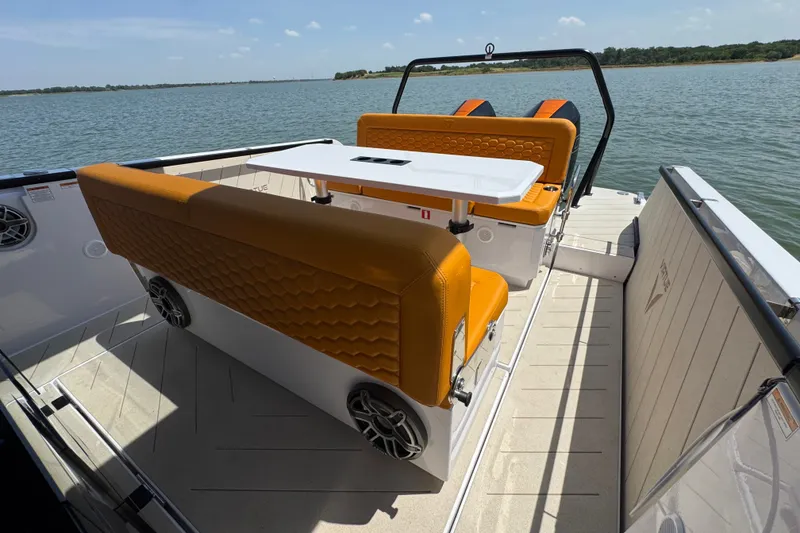 Slide: The Image of Luxury seating area on 2026 VIRTUE YACHTS V33 Top, overlooking serene waters. - 25