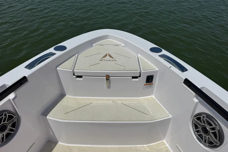 Slide: The Image of Bow view of 2026 VIRTUE YACHTS V33 Top, featuring sleek design and modern speakers. - 13