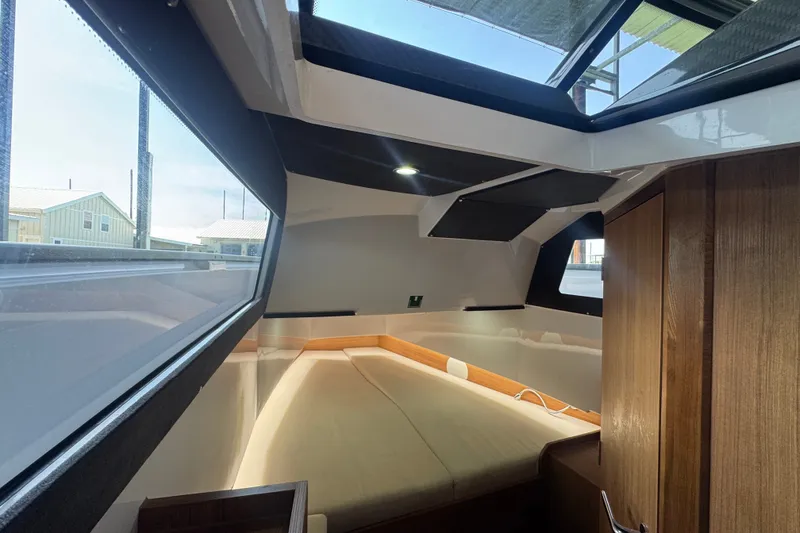 Slide: The Image of Interior cabin of 2026 VIRTUE YACHTS V33 Top with modern design and large windows. - 8