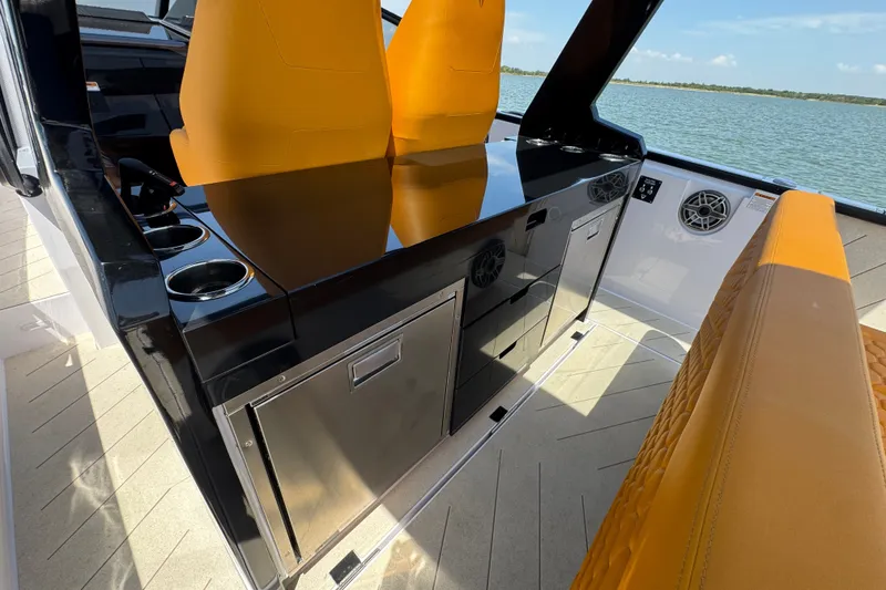 Slide: The Image of Luxury interior of 2026 VIRTUE YACHTS V33 Top with sleek seating and modern amenities. - 26