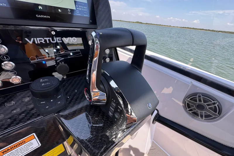 Slide: The Image of Control panel of 2026 VIRTUE YACHTS V33 Top with Garmin navigation system. - 23