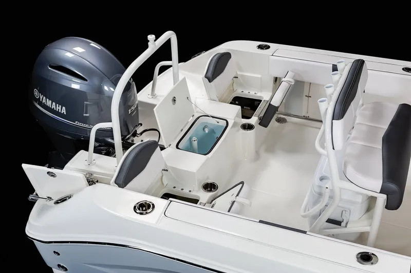 Slide: The Image of Manufacturer Provided Image: 2021 Robalo R200 Center Console boat with Yamaha engine, featuring seating and storage compartments. - 16