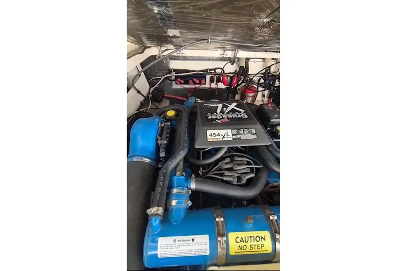 Slide: The Image of Engine compartment of a 1998 Pursuit 3000 Offshore boat with 454 XL engine. - 15