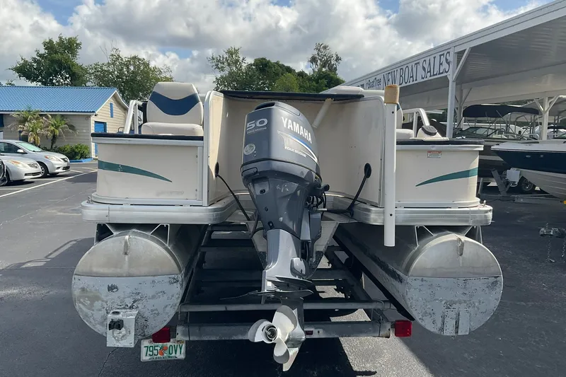 Slide: The Image of 2004 Sweetwater Challenger 200 FC pontoon boat with Yamaha 50 outboard motor at dealership. - 3