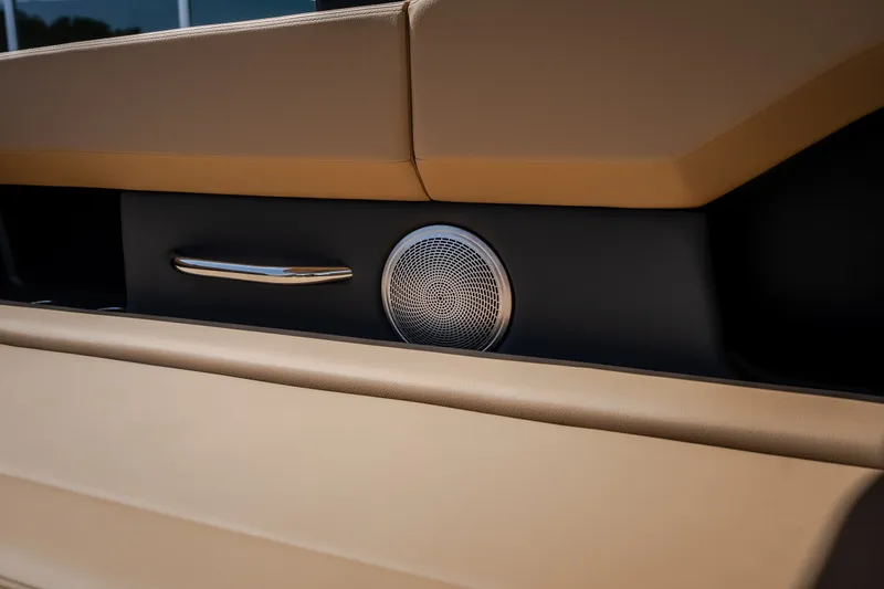 Slide: The Image of 2026 Chris-Craft Sportster 28 interior detail with speaker and handle. - 23